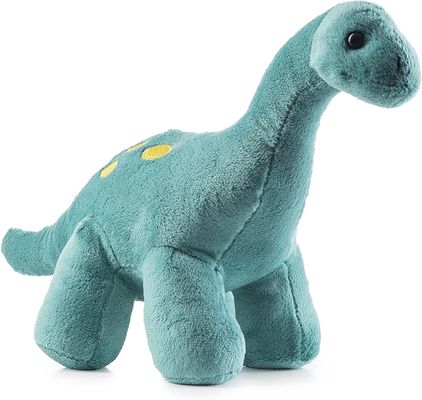 長い先の尖った歯を搭載する緑のティラノサウルス・レックスのplushおもちゃ浮彫りにされたせん断のプラシ天から成っている恐竜のplushおもちゃ