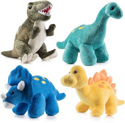 長い先の尖った歯を搭載する緑のティラノサウルス・レックスのplushおもちゃ浮彫りにされたせん断のプラシ天から成っている恐竜のplushおもちゃ